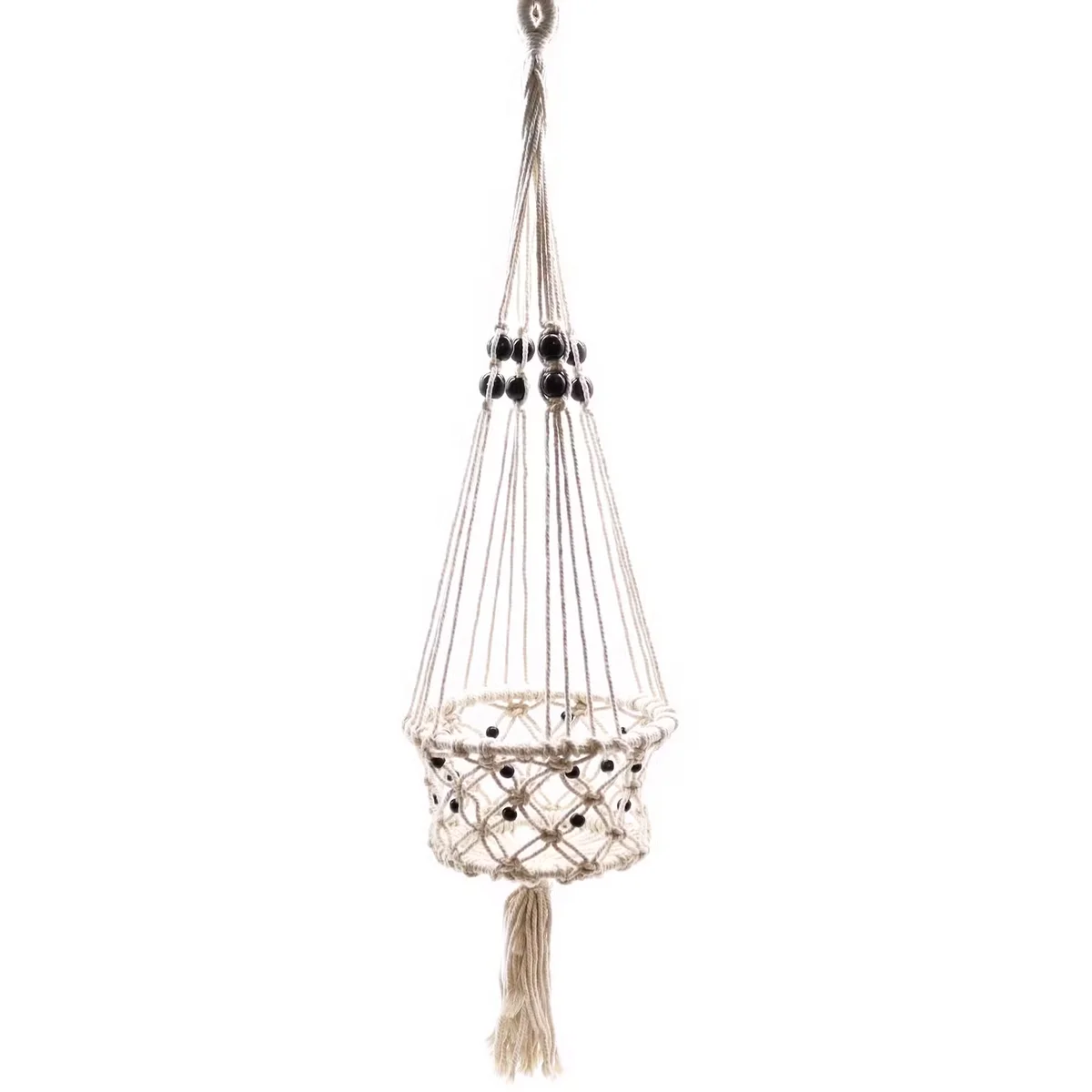 Large handmade macrame holder with single bead detail, designed as a pot holder hanging against a plain background