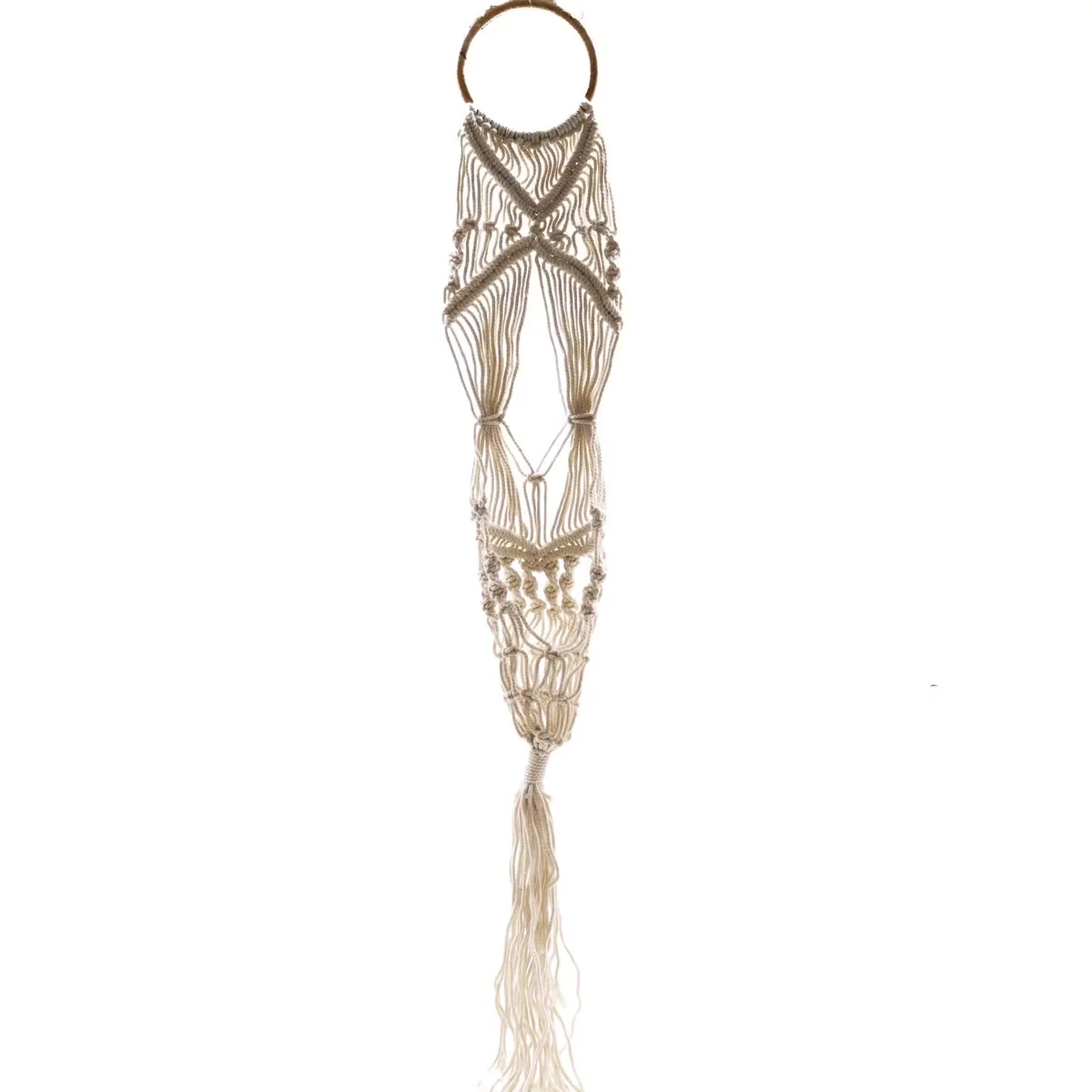 Long macrame pot holder with rattan hoop, styled as a boho plant hanger for indoor greenery display