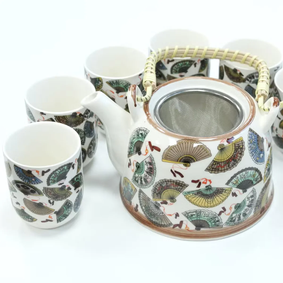 Herbal tea set with a china teapot set and matching China Fans.