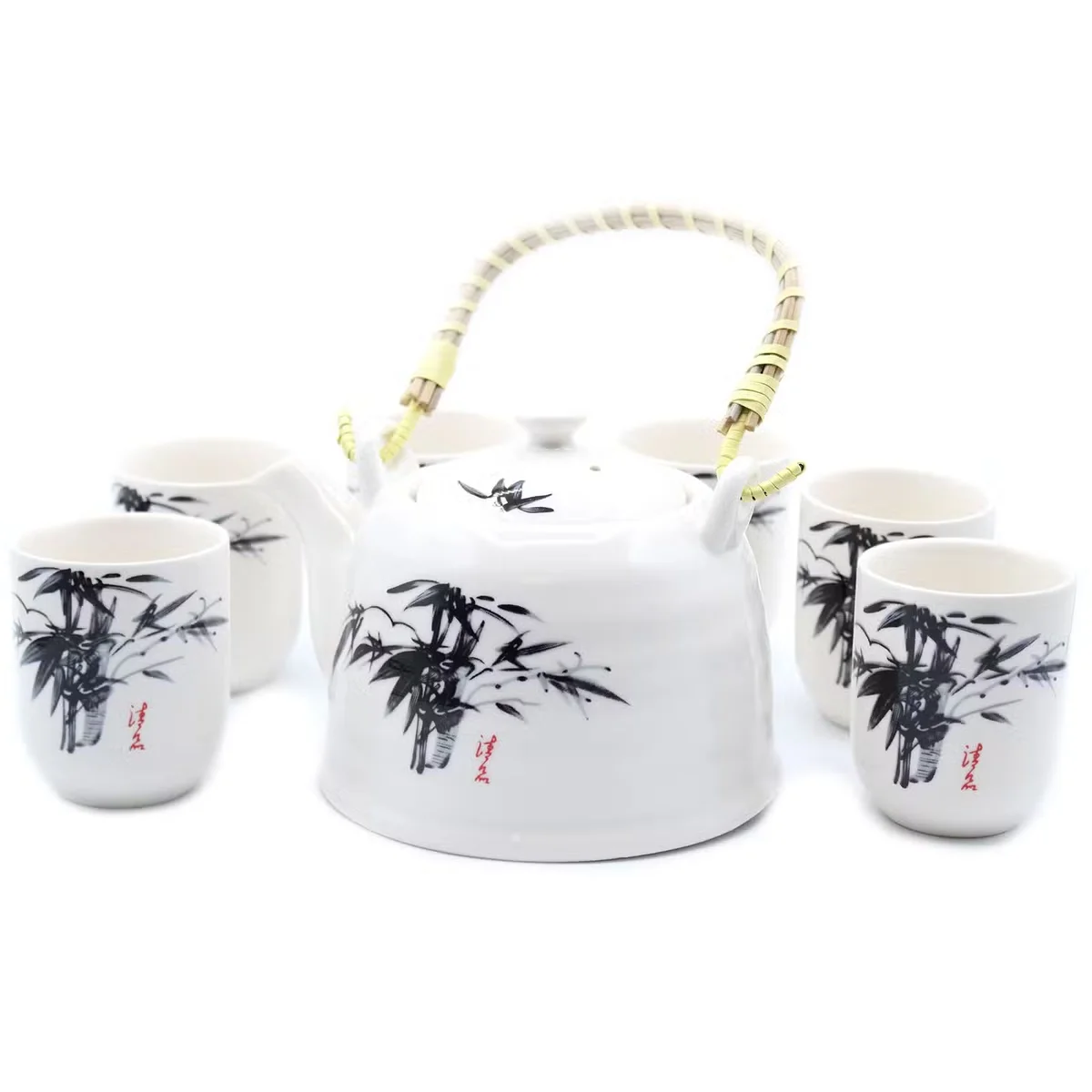 White stone herbal teapot set with oriental design, part of a tea brewing set, shown on a plain background