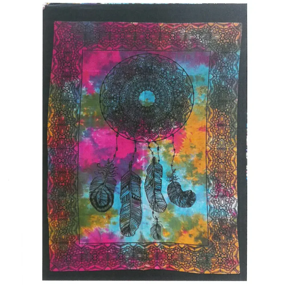 Cotton dream catcher wall art featuring intricate woven design and hanging cotton threads on a white background