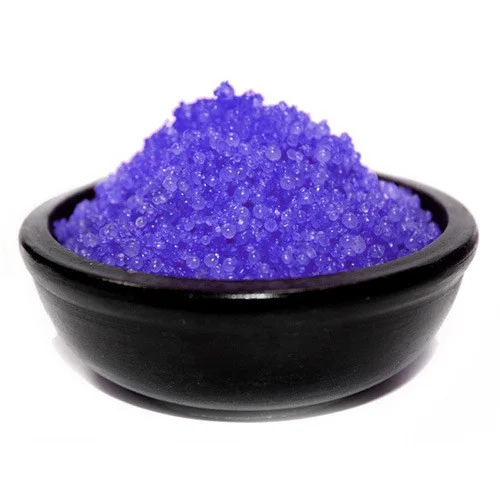 Blackberry Simmering Granules in a clear bowl for making a blackberry drink mix on a white background