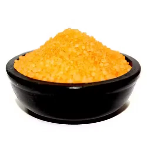Close-up of orange scented granules with cinnamon pieces for simmering and fragrance release