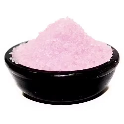 Japan Magnolia Simmering Granules UK packaging with granules spilled beside the container on a white background