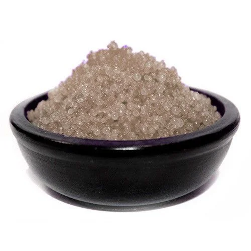 Close‑up of sandalwood simmering granules.