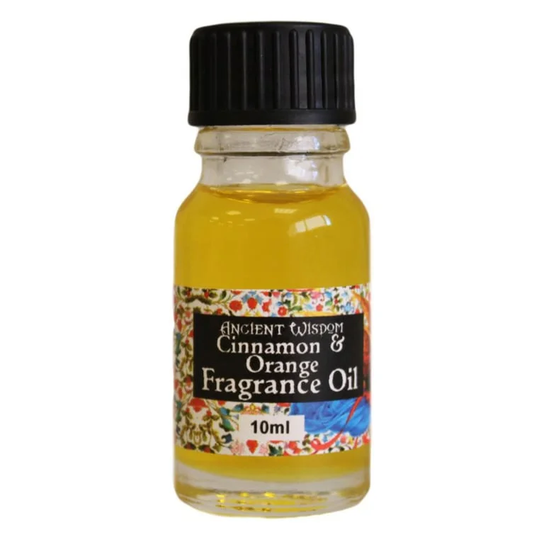 10ml glass dropper bottle of Xmas essential oil Cinnamon & Orange, labelled with holiday theme.
