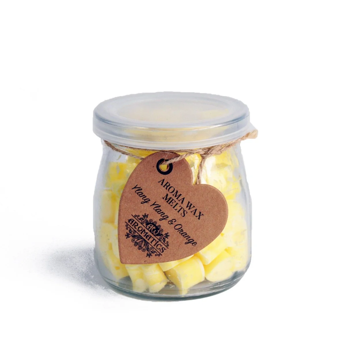 Ylang ylang orange wax melt on a neutral background.