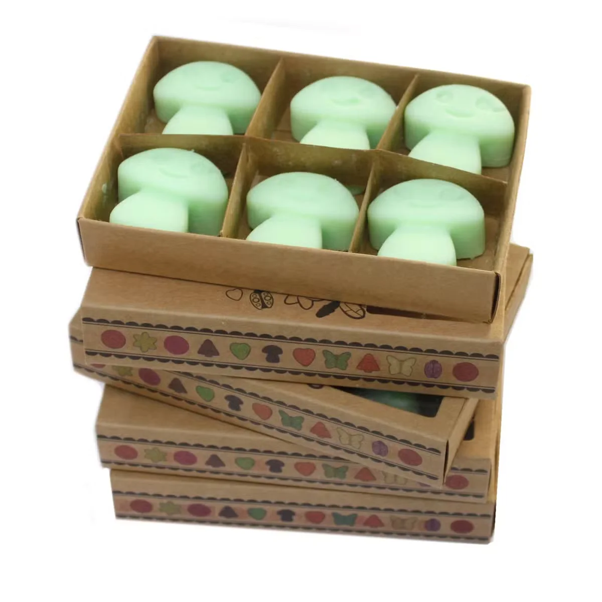 Box of six black liquorice fragrance wax melts arranged in a neat row on a white background