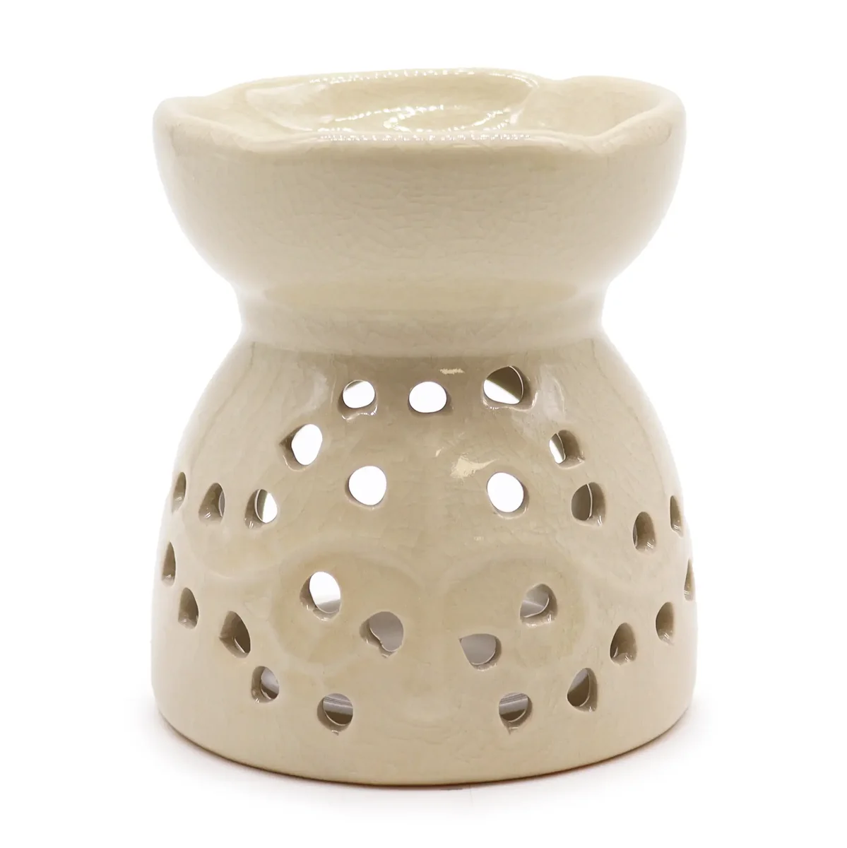 ivory oil burner with Tree of Life design, white ceramic base, branching figure, glowing oil flow