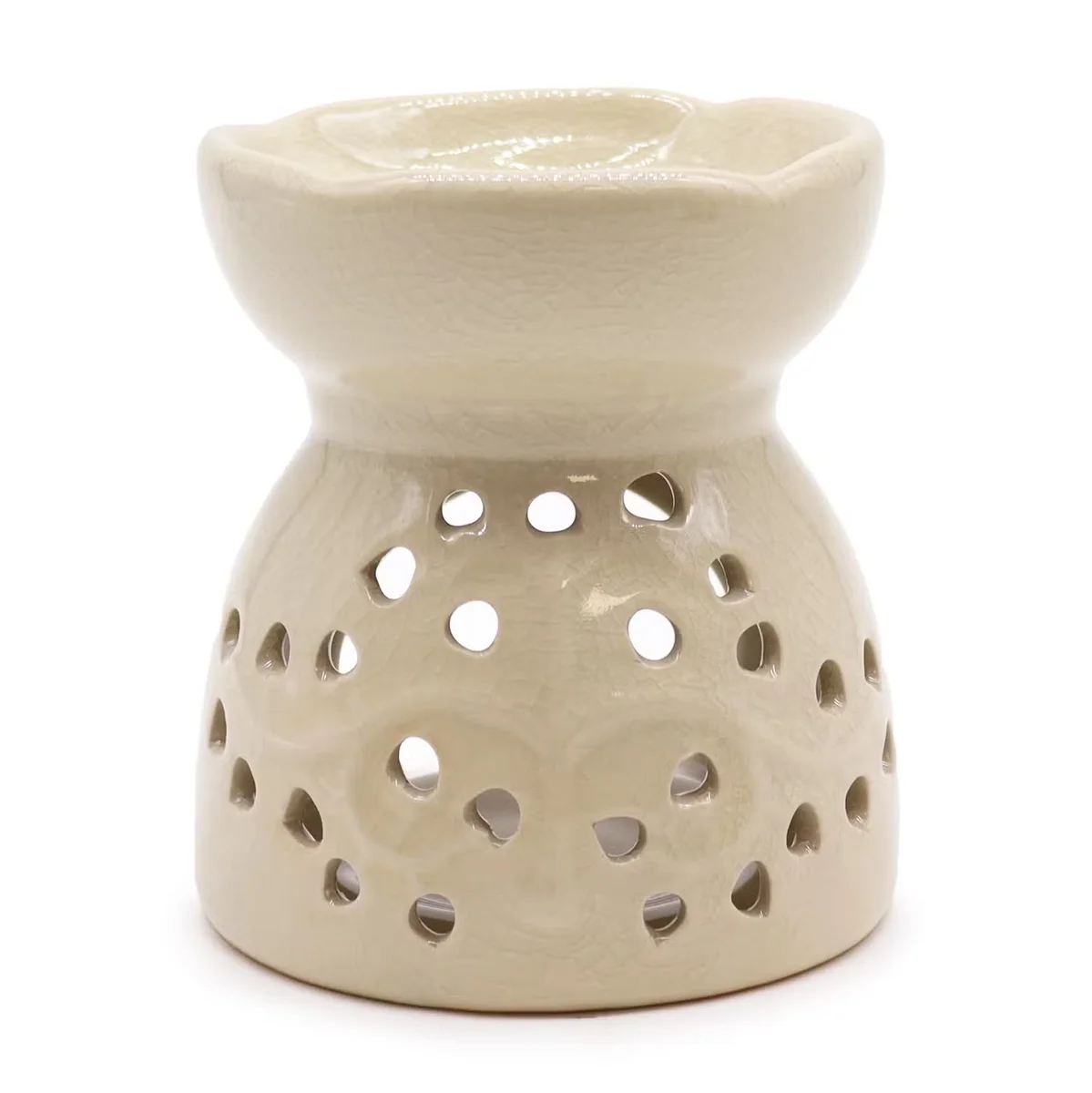 Ivory tree of life oil burner with carved branches and hanging silk cords, stylish tree of life decor.
