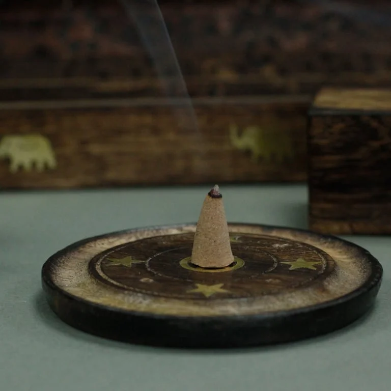 Mango wood incense disc 10cm shown alone, featuring its natural wood finish.