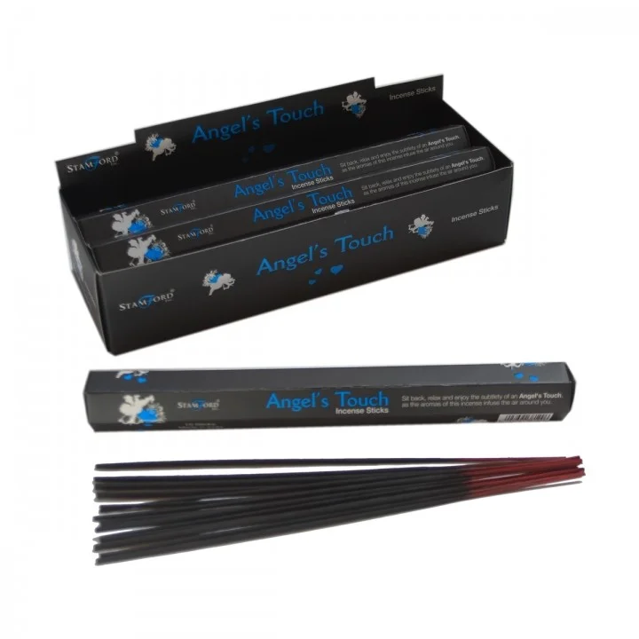 Elegant bundle of fragrant incense sticks arranged in a wooden box, ready to light