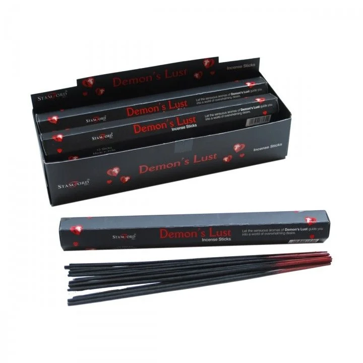 Demon's Lust incense sticks arranged on a simple surface.