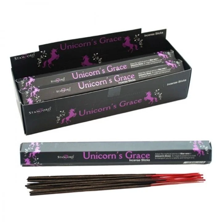 Long flat incense sticks in a white tin box marked Unicorn's Grace, stacked in a neat bundle, labeled "unicorn incense sticks".