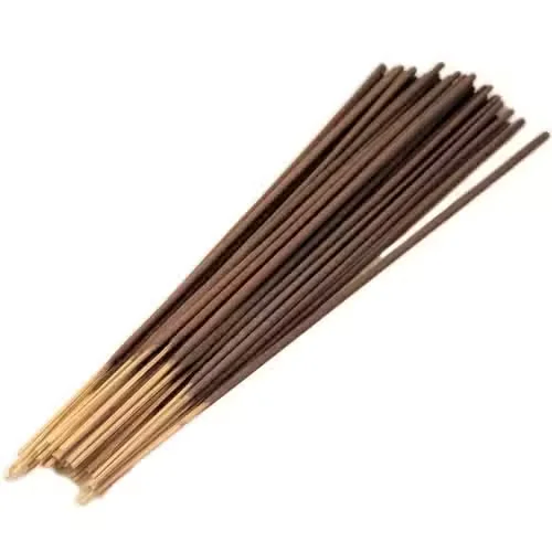 Cluster of gold Vertiver incense sticks displayed in a bulk pack on a wooden tray