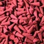 Bulk pack of dragons blood incense cones arranged in a small bundle
