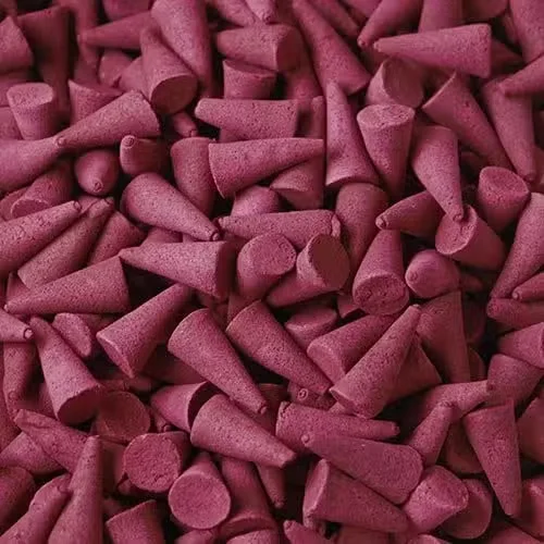 Strawberry incense cones bulk displayed neatly on a wooden tray.