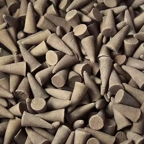 Bulk incense cones patchouli displayed in a stack on a neutral background.