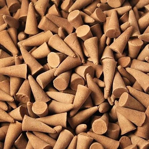 Bulk pack of peach mango incense cones in a small box
