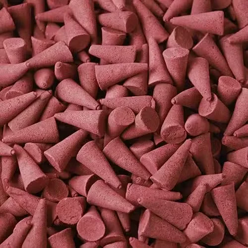 Stack of sandalwood incense bulk cones displayed in a package, showing multiple identical cones in a neat arrangement.