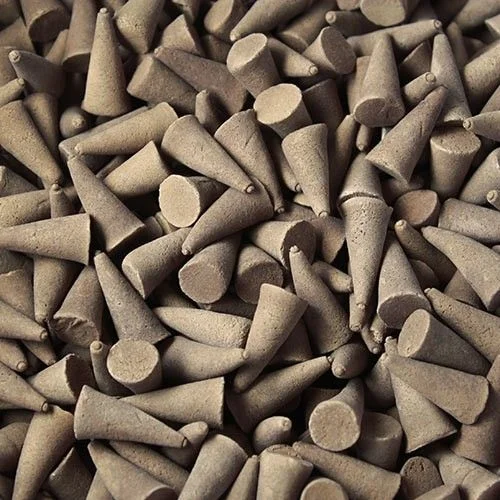 Bulk vanilla incense cones displayed in a neat pile