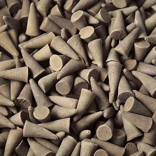 Bulk incense cones scented vanilla displayed in a neat stack.