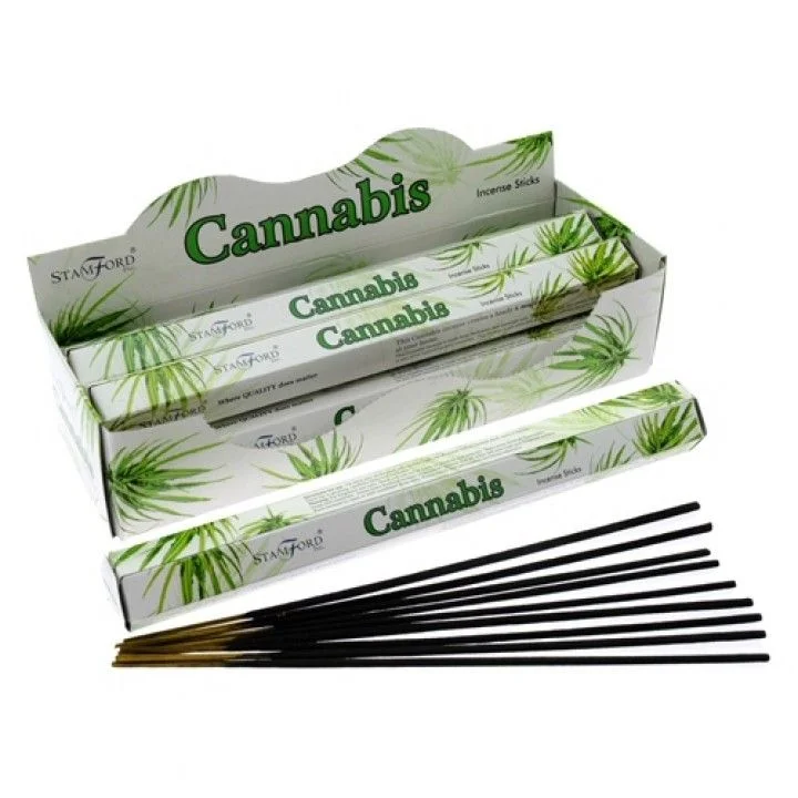 Box of cannabis incense sticks arranged neatly on a flat surface.