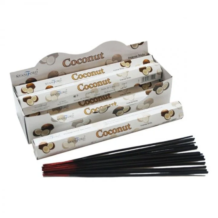Bundle of coconut incense sticks in a simple paper holder
