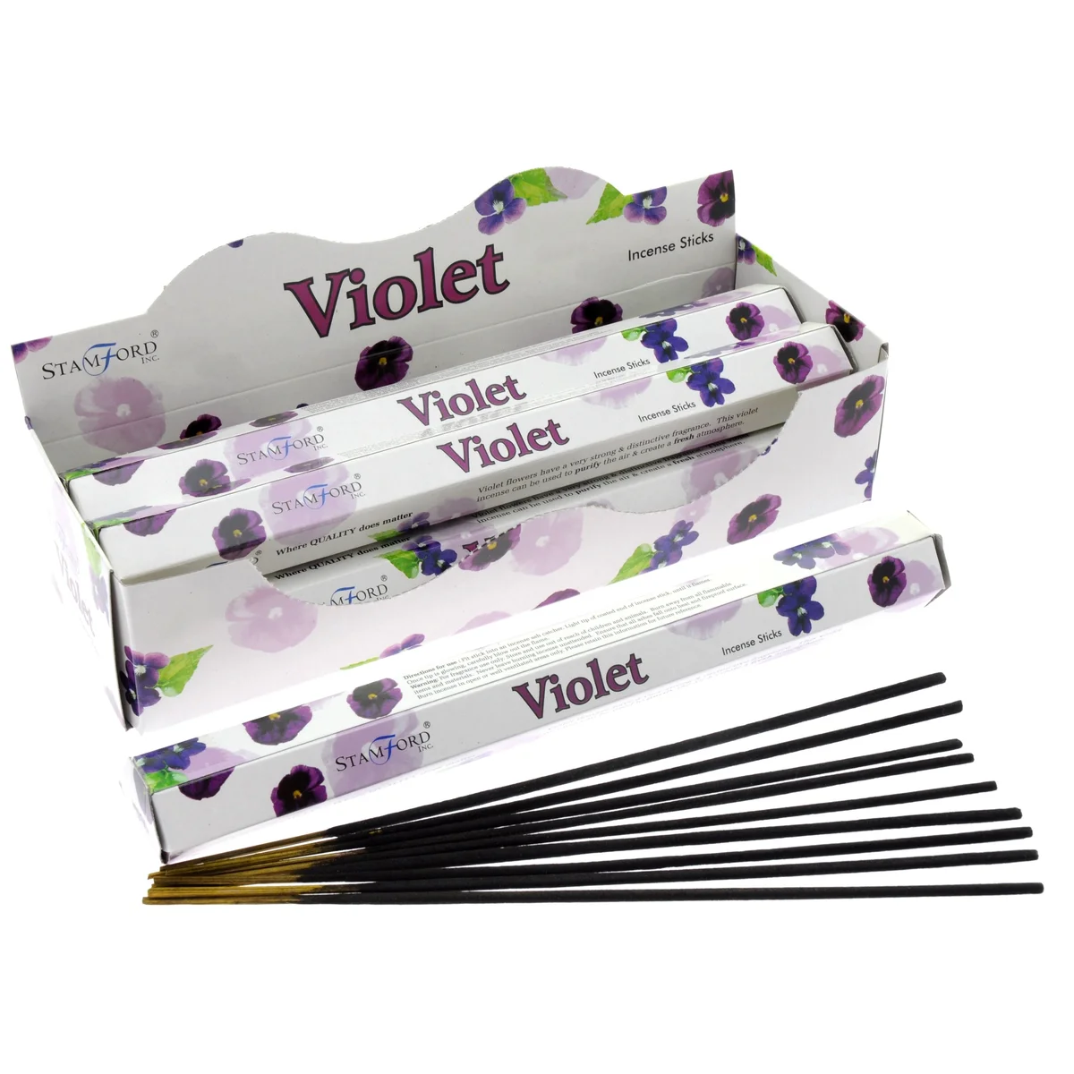 Violet incense sticks on a wooden block, their tips slightly charred, surrounded by a small violet box