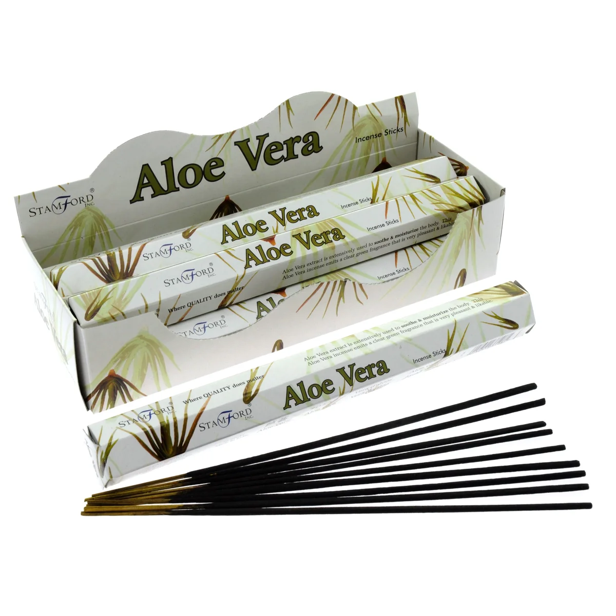 A stick of aloe vera incense, brown with paper wrap, lying on a neutral surface.
