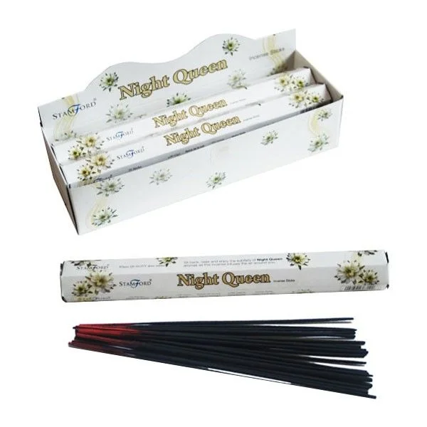 Black incense sticks arranged in a brown wooden box, labelled Night Queen incense.
