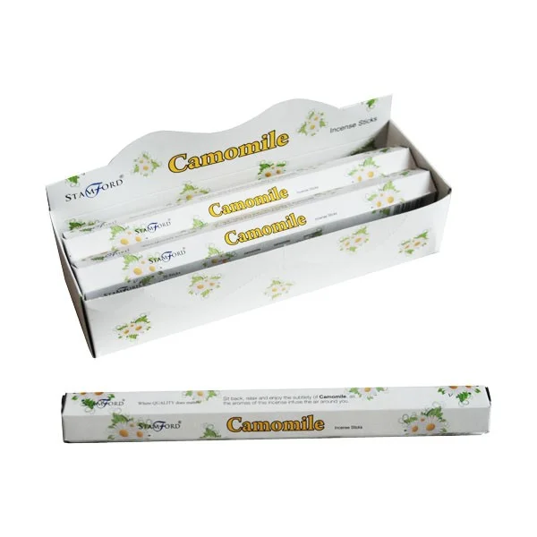 Bundle of camomile scented incense sticks arranged neatly in a bamboo basket.