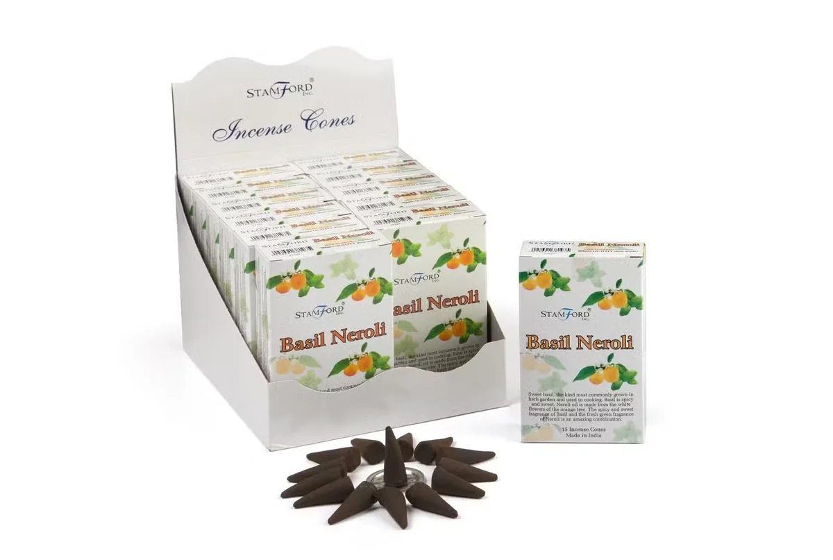 Basil and Neroli scented herbal incense cones displayed in neat rows.
