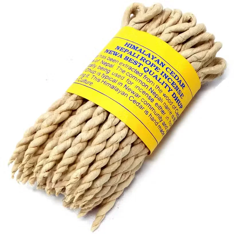 Pack of natural cedar incense ropes in a paper wrapper.