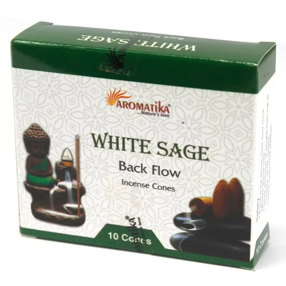 White sage incense cones arranged on a wooden tray.