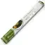 White sage incense sticks bundled in a wooden holder on a wooden table.