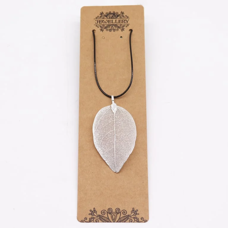 Silver leaf pendant necklace displayed against a neutral background, showcasing a single leaf-shaped charm on a delicate chain.