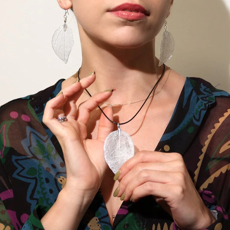 Silver bravery leaf necklace featuring a leaf charm on a silver chain.