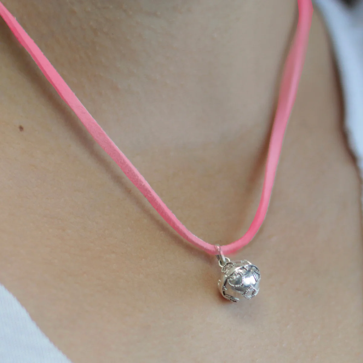 12mm silver bell with angel and love design.