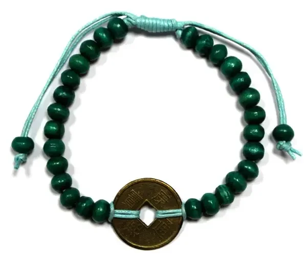Green good luck Feng‑Shui bracelet featuring a subtle metallic twist design.