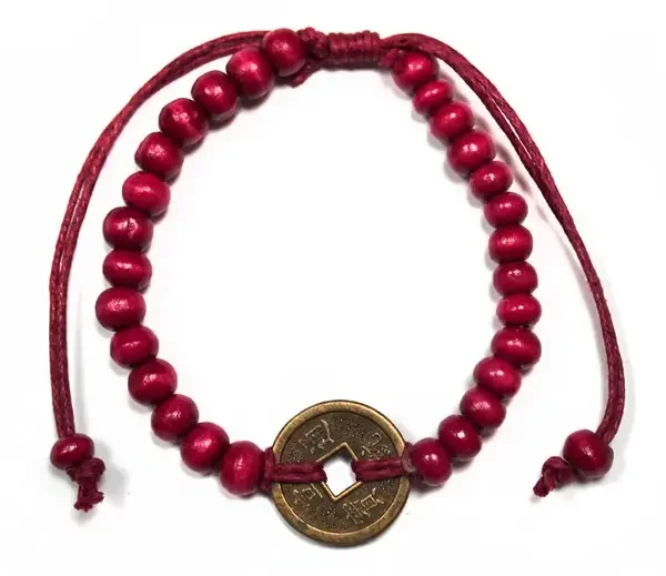 Red good luck bracelet featuring a Feng-Shui design.