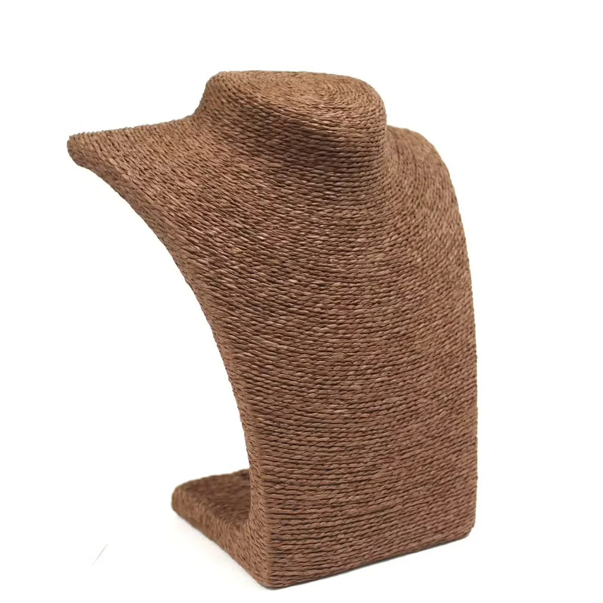 Small chocolate display for necklaces, showing a minimalist case with a subtle clasp and a single necklace hanging