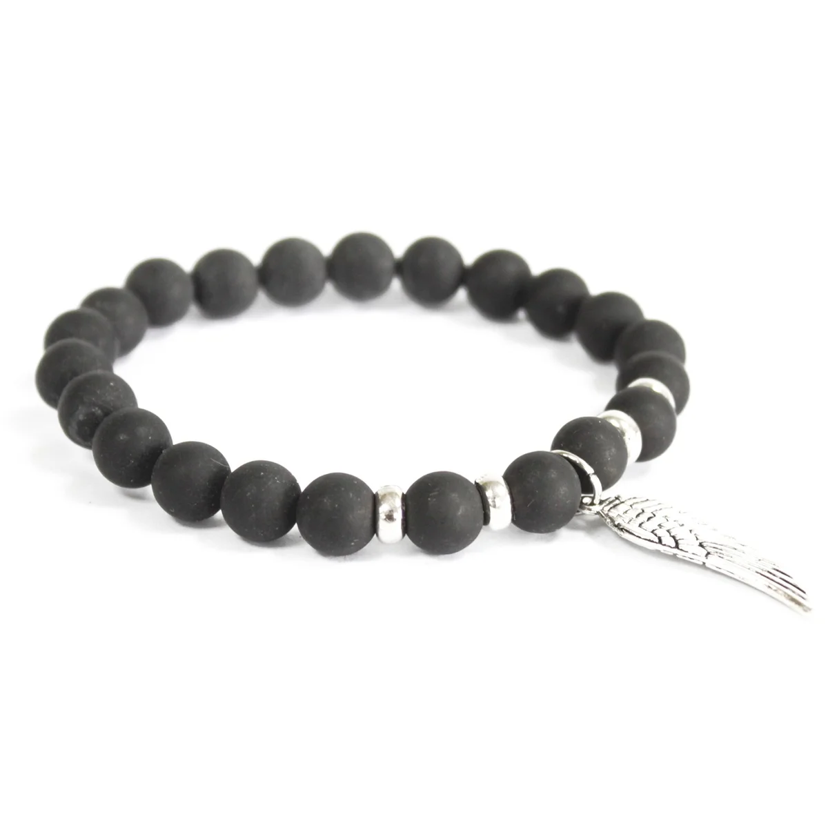 Black agate bracelet with angel wing motif, shown on a smooth surface.