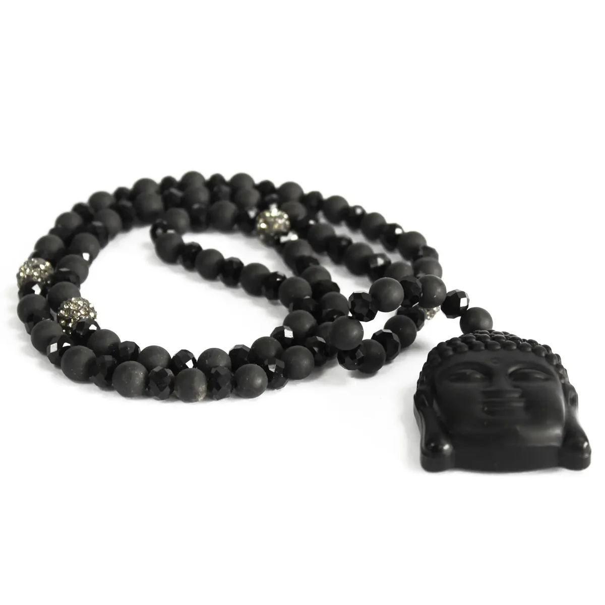 Buddha pendant displayed on a black stone necklace.