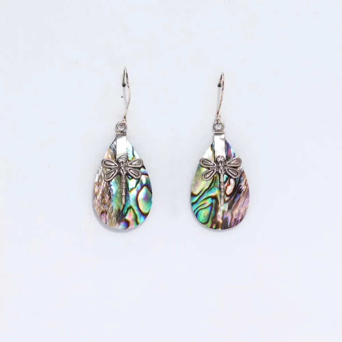 Dragonfly earrings featuring abalone shell and silver detailing