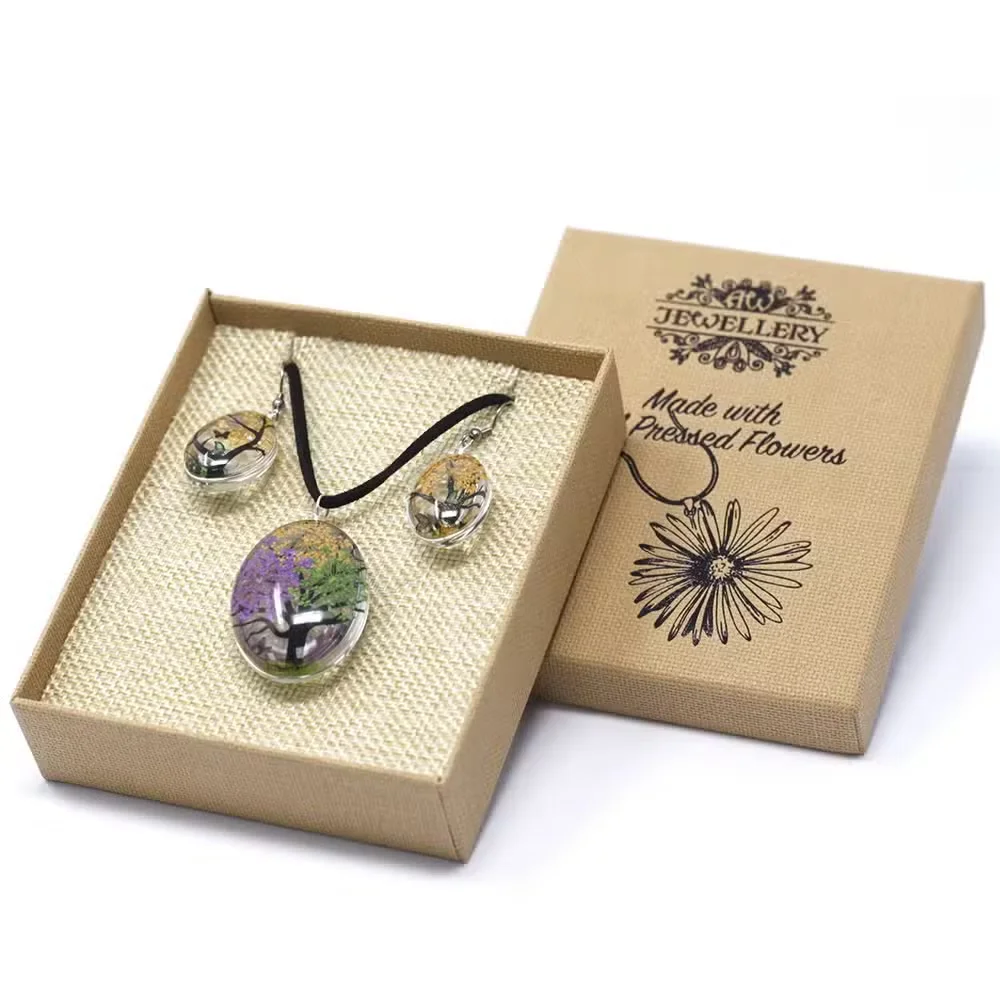 Pressed flower set featuring a mixed colour Tree of Life design in pressed petals and leaves