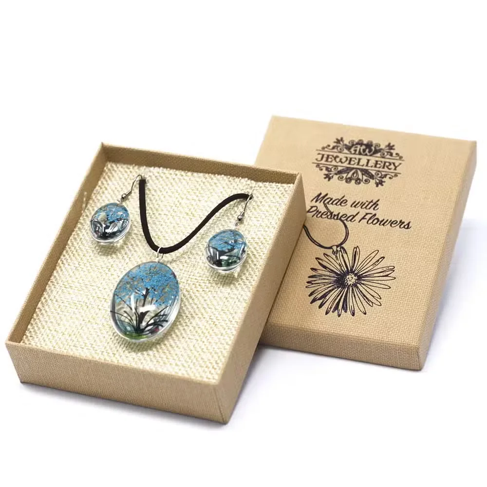 Pressed flower set decor in teal featuring a Tree of Life design