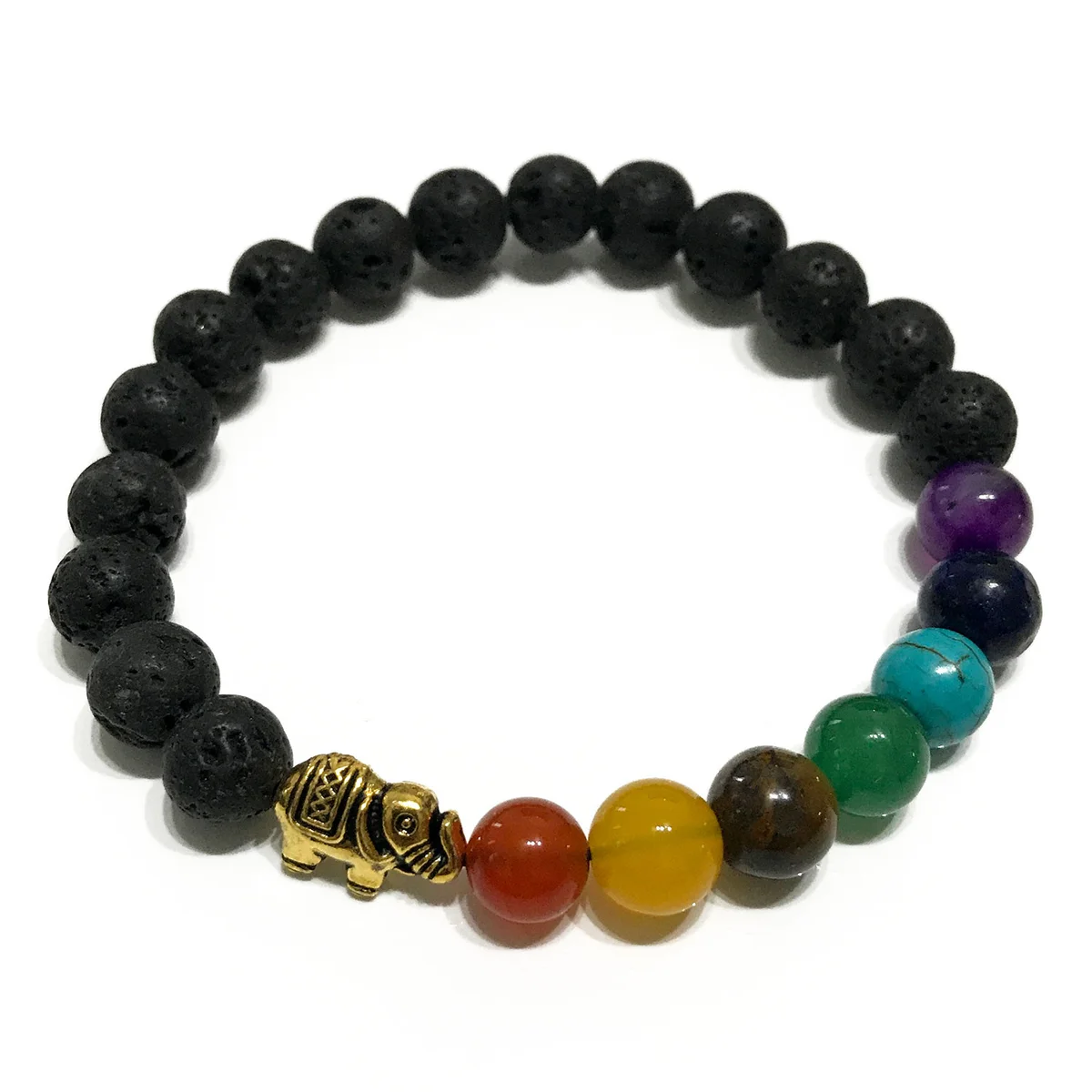 Lava stone bracelet with carved elephant motif, worn on a wrist – a piece of chakra jewellery.