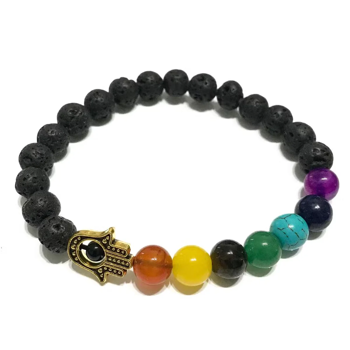Wrist wearing lava stone bracelet featuring a Hamsa chakra design, showcasing natural lava stone jewellery.