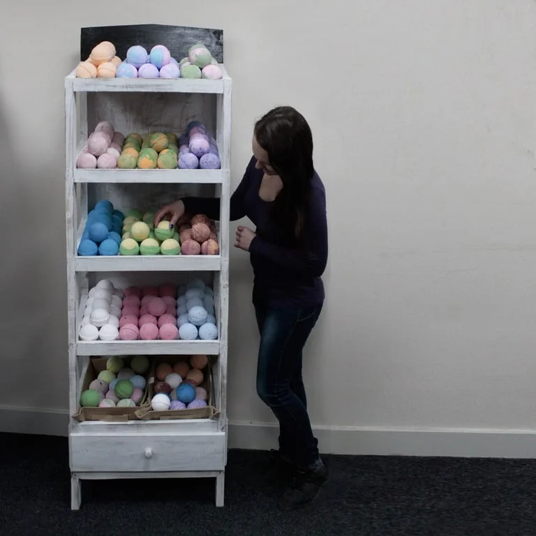 Whitewash bath bomb shelf displaying five whitewash bath bombs